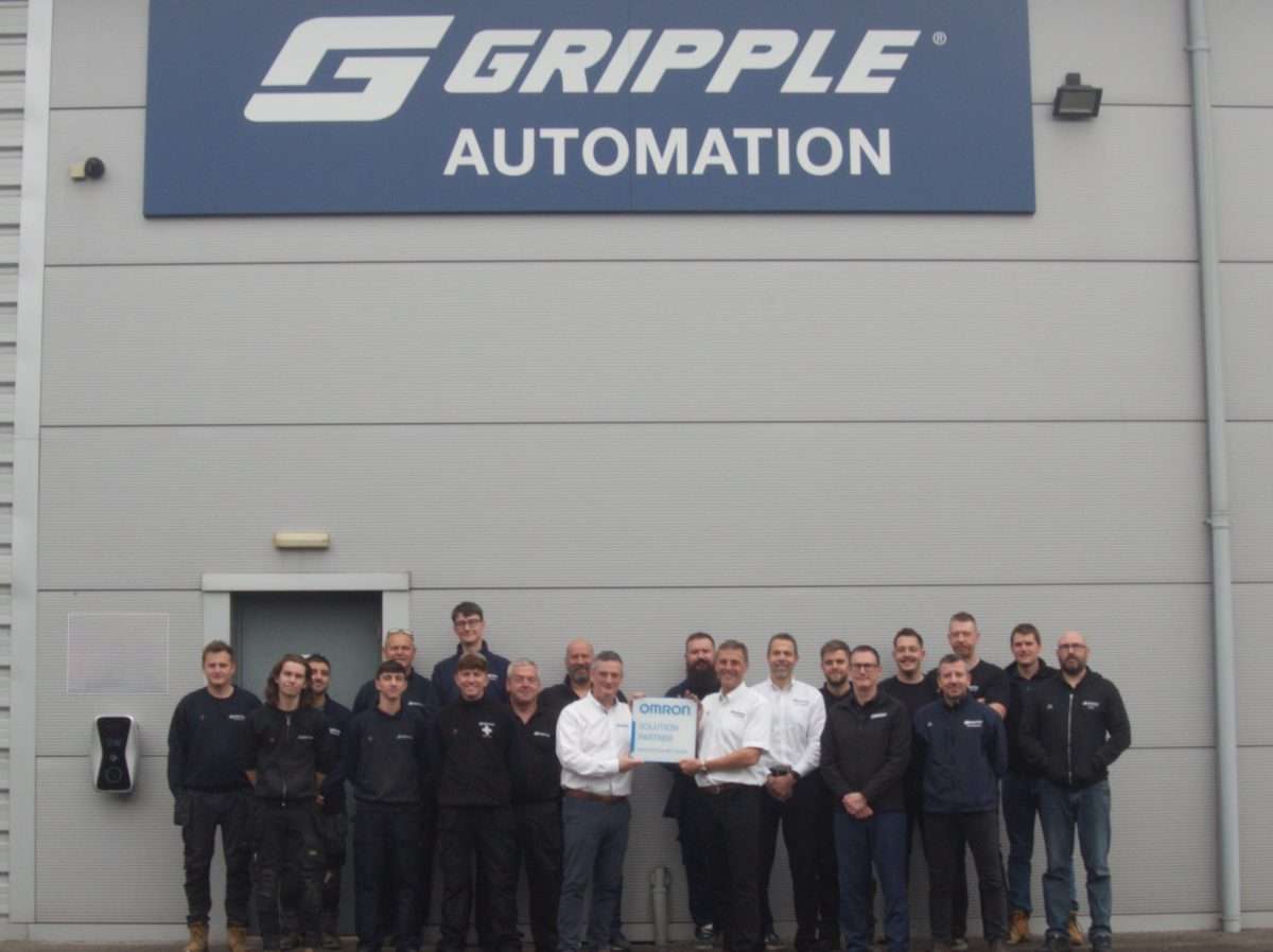 Robert Meechan, OMRON System Integrator Manager and Justin Newborn, Gripple Project & Application Manager hold partnership plaque.