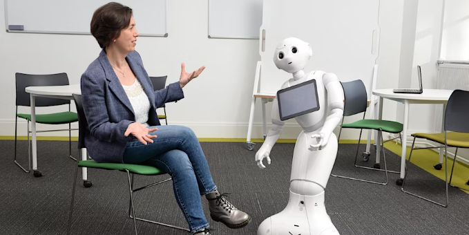 Professor Anikó Ekárt and 'Pepper' the robot